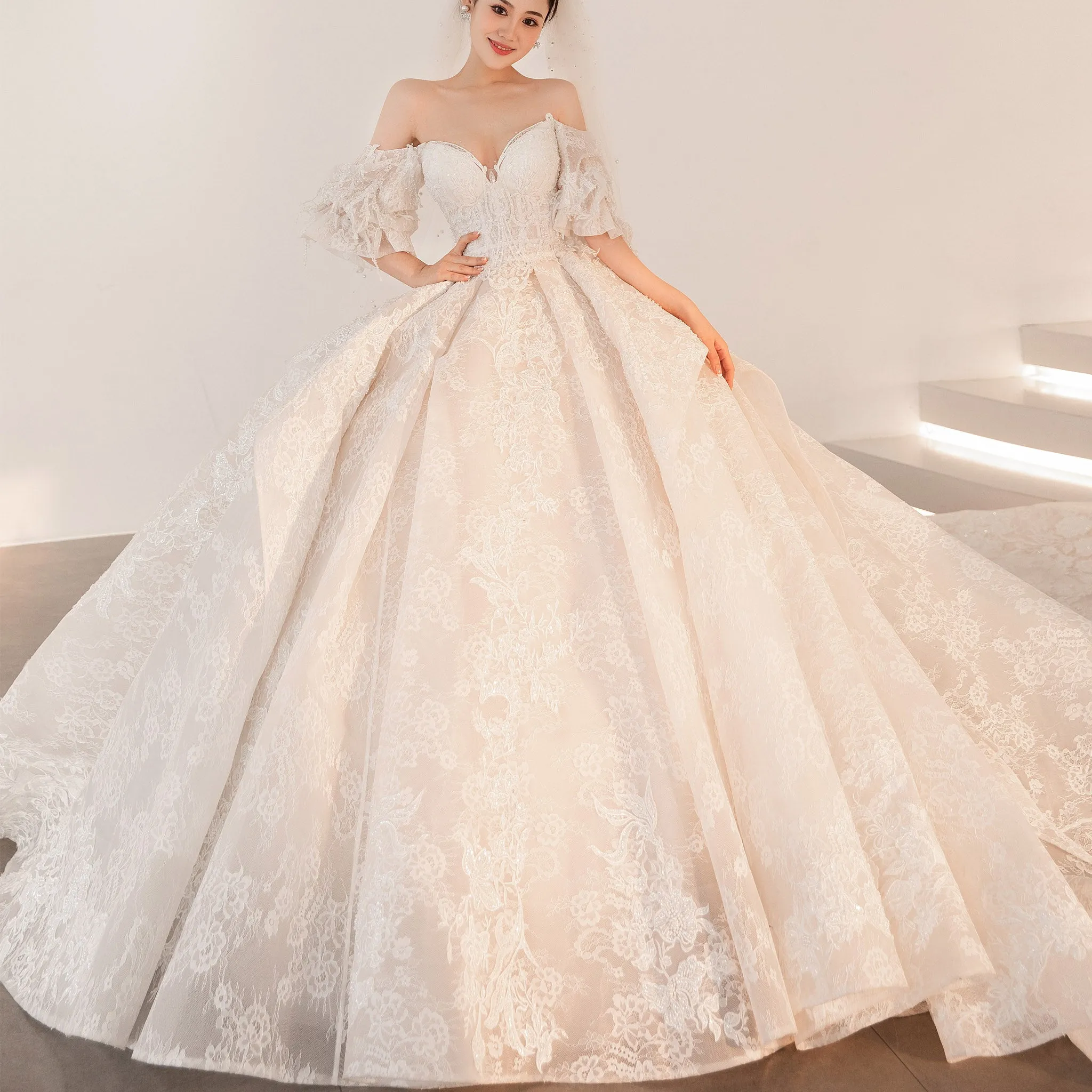 Boho Off Shoulder Lace Wedding Dress with Puffy and Big Train